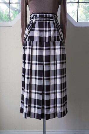 her lip to pleated checkered twill long skirt