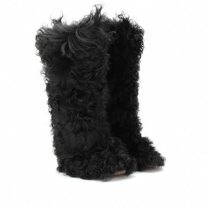 ISABEL MARANT Glissy shearling boots