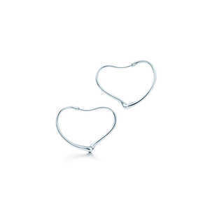TIFFANY & Co. Elsa Peretti® Open Heart hoop earrings.