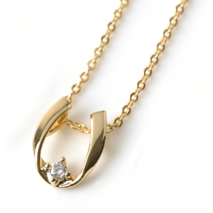 cream dot ホースシューネックレス